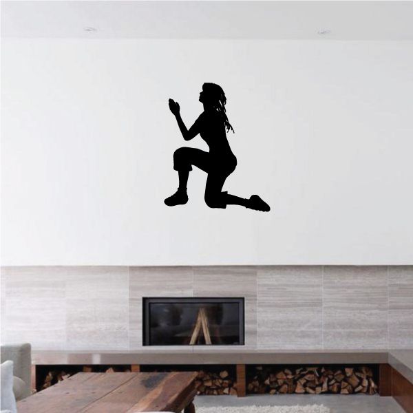 Black wall decal silhouette of kneeling mother praying with child beside her