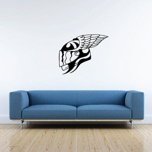 Motorcycle helmet decal with white wing graphic on dark background