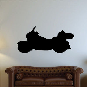 Motorcycle wall decal, black vinyl silhouette of a sport bike on a light wall