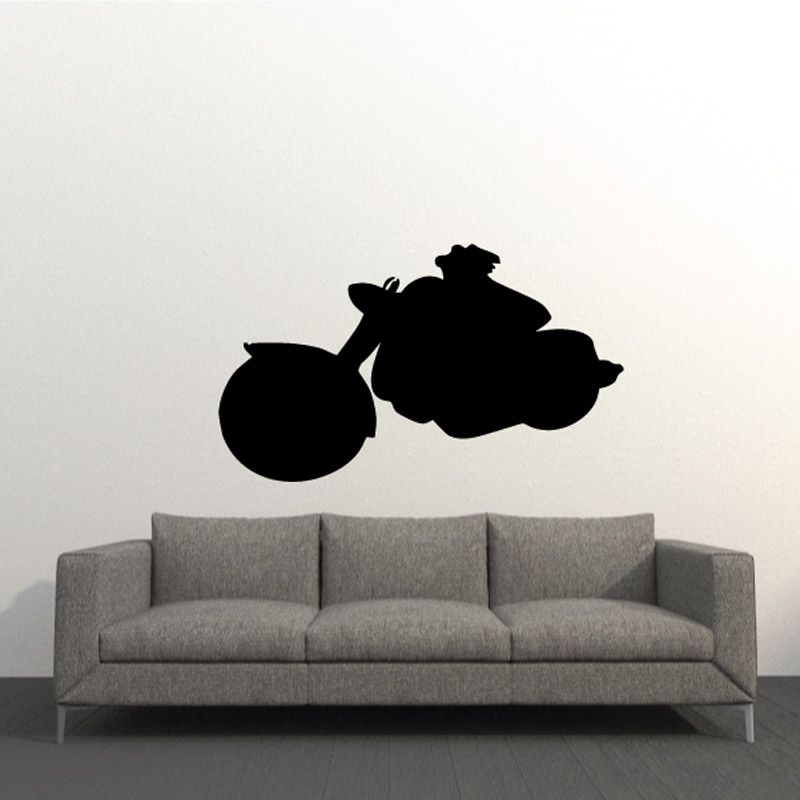 Black motorcycle silhouette wall decal on a plain wall