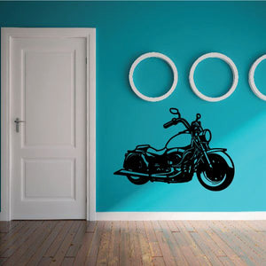 Motorcycle vinyl wall decal: black bike silhouette with three white circular rings