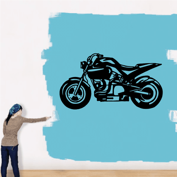 Motorcycle wall decal in black line art on a light surface.
