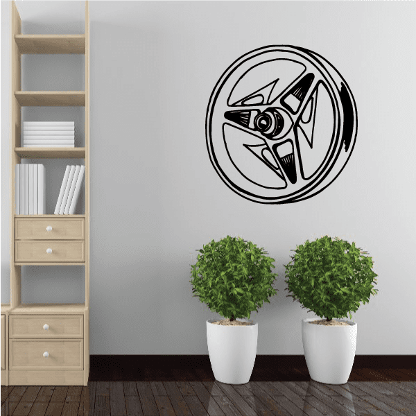 Large vinyl motorcycle wheel wall decal with black circular rim and face