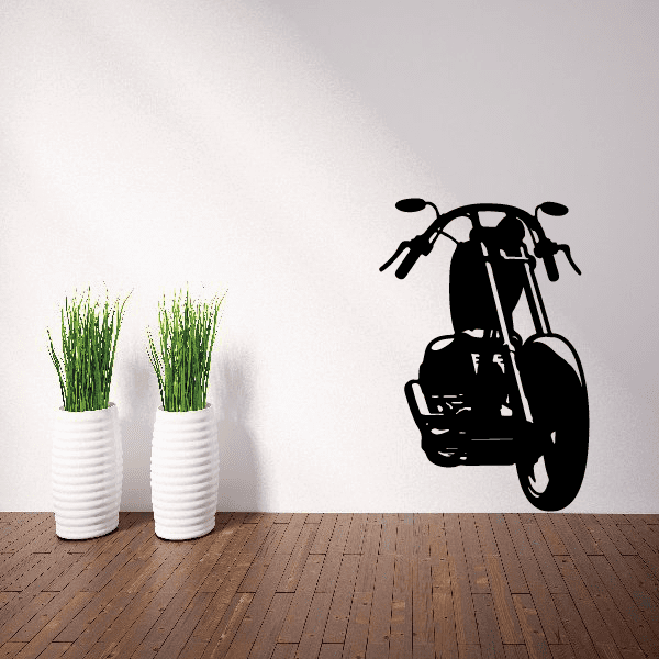 Motorcycle wall decal, black vinyl silhouette of a motorcycle on a light wall.