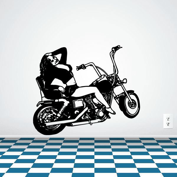 Motorcycle vinyl wall decal of a black bike with rider helmet on white
