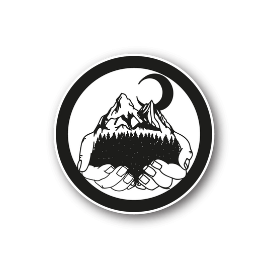 Vinyl sticker with black-and-white mountains in two hands, circular border