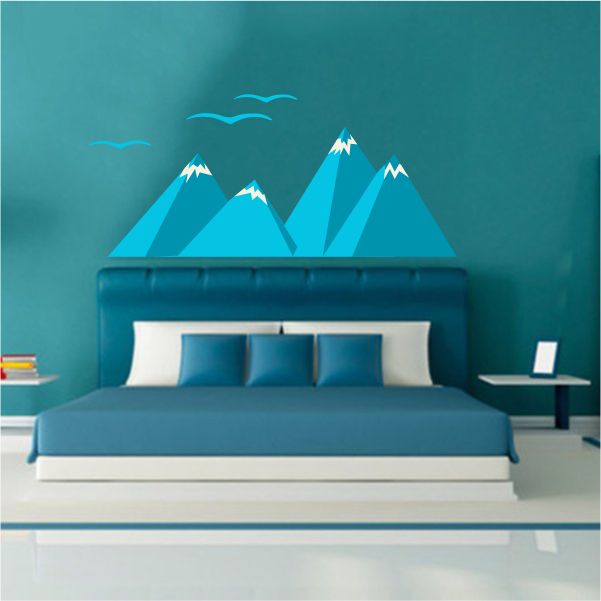 Mountains wall decal with blue mountain peaks and white snow caps, plus small bird shapes