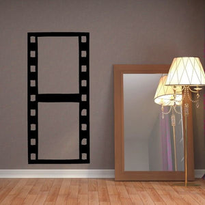 Movie film strip wall decal in black, vertical rectangle with sprocket holes