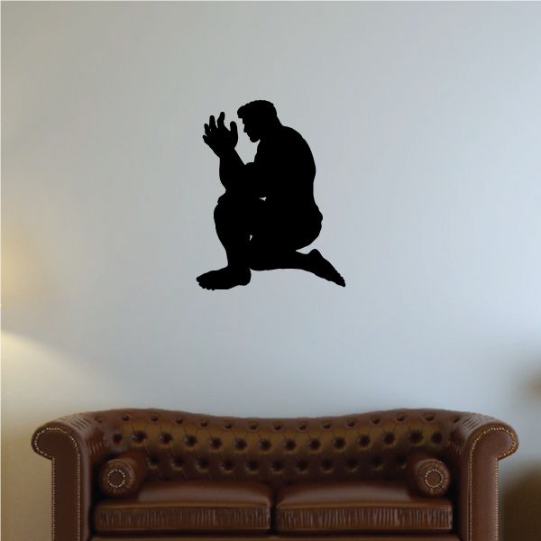 Black sitting muscle man decal with hands together, praying pose
