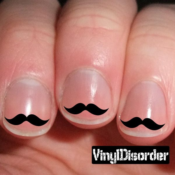Nail art vinyl decal sticker with black mustache on nude pink nails