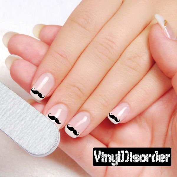 Mustache nail art vinyl decal stickers with black mustache on light pink nails