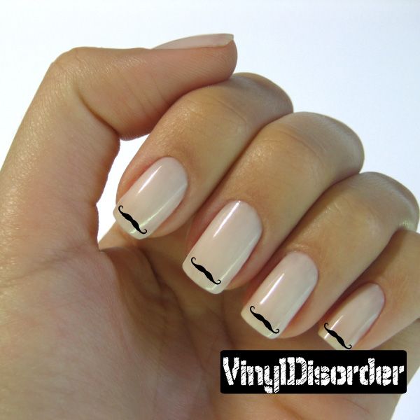 Mustache nail art vinyl decal stickers on nude nails, cream base with black mustaches