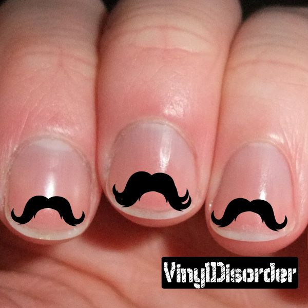 Mustache nail art vinyl decal sticker on clear nails, featuring three black moustaches