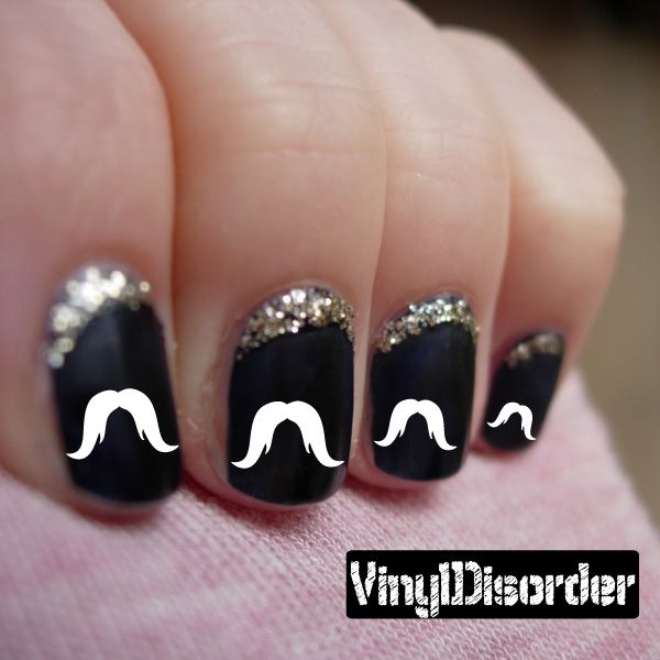 Mustache nail art vinyl decal stickers on dark nail polish, three nails visible