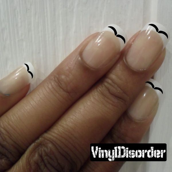 Mustache nail art vinyl decal stickers on fingernails, black curled mustache tips