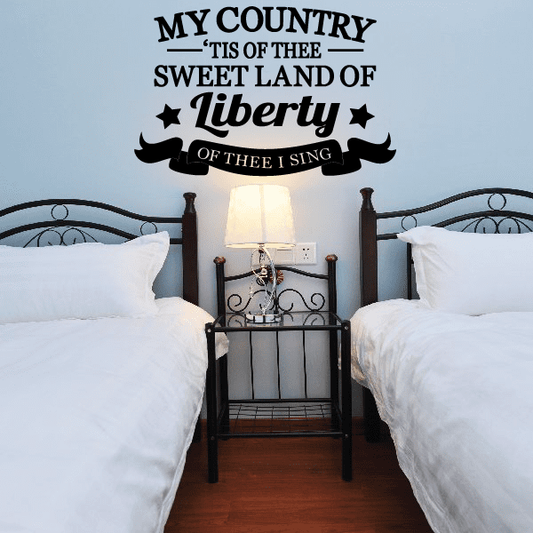 Patriotic wall decal text "My Country Tis of Thee" with stars and ribbon banner