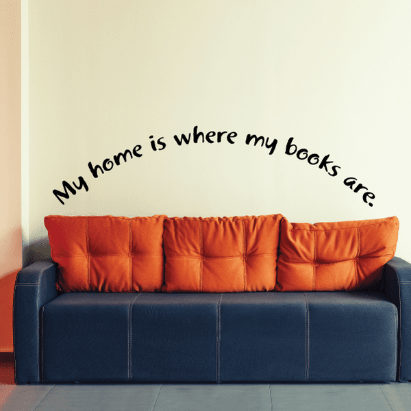 Wall decal with the text "My home is where my books are" in black lettering