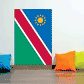 Namibia flag sticker with red diagonal stripe and white borders, blue with yellow sun
