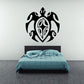 Black stylized sea turtle decal with ornate circular design and teal accents
