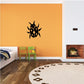 Ladybug wall decal with black wings and yellow spots