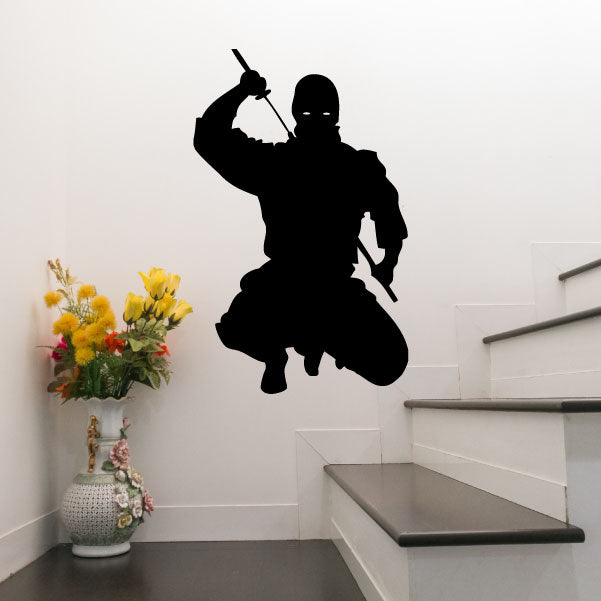 Ninja decal: black silhouette of ninja in mid-air with sword raised
