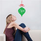 Noel ornament printed decal: green heart with white Noel script and red bow