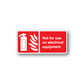 Warning sticker with red symbol and 'Not for use on electrical equipment'