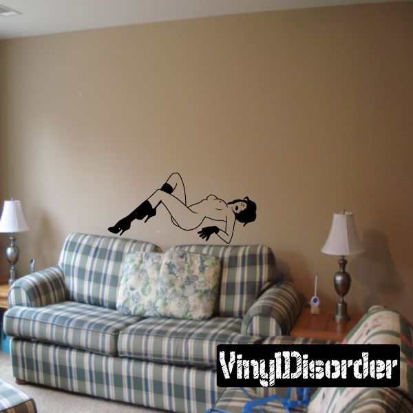 Nude woman in high-heel boots wall decal