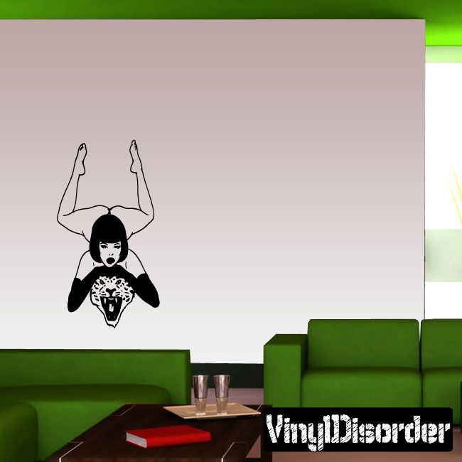 Pinup woman on tiger head vinyl decal with raised arms, black-and-white design