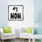 Wall decal with bold black text “#1 MOM” on a white square background