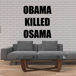 Black wall decal with bold text: "OBAMA KILLED OSAMA"