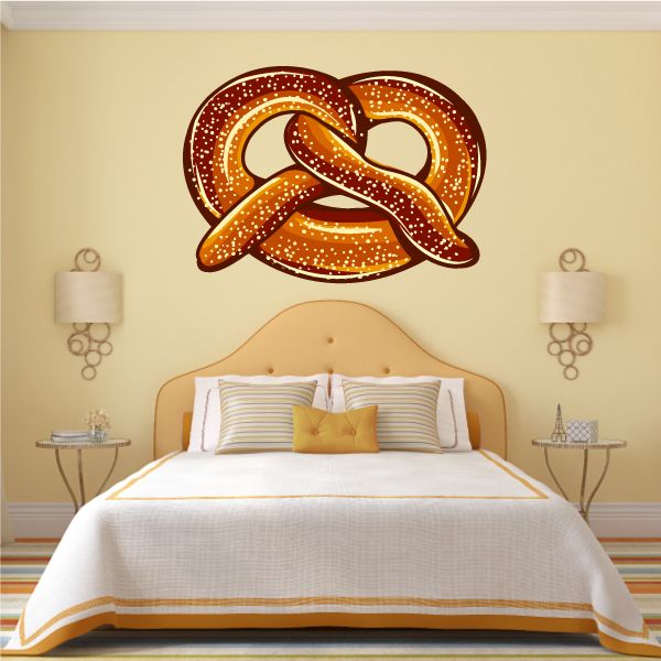 Oktoberfest pretzel wall decal in brown and gold, vinyl lettering-style icon