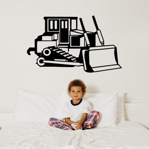 Old fashioned bulldozer decal with bold black line-art front loader