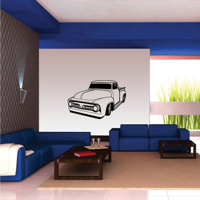 Pickup truck wall decal with black outline and white fill, mounted on wall