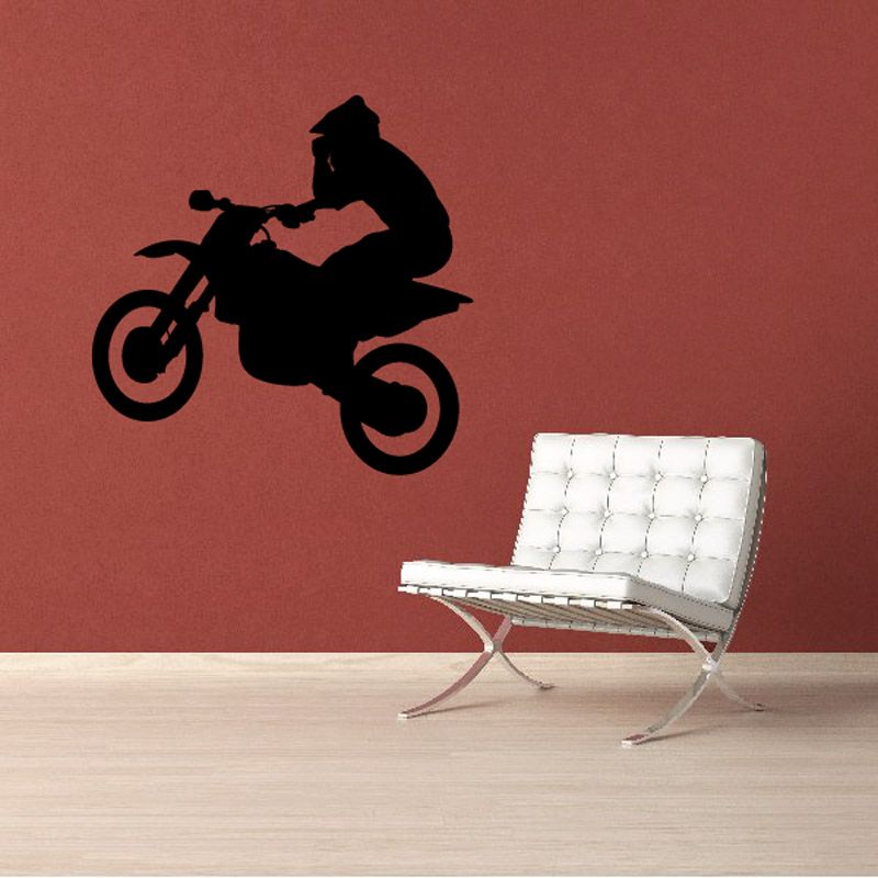 Dirt bike jump decal with rider silhouette performing one-hand jump