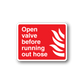Red hose warning sticker with white text: Open valve before running out hose