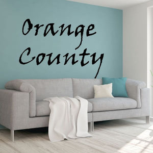 Orange County wall decal with black cursive lettering