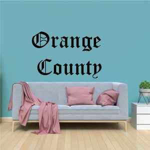 Old English decal: black 'Orange County' lettering