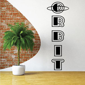 Orbit decal with black orbit icon and stacked letters on light surface