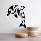 Black dolphin wall decal with stylized flowing tail design