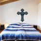 Ornate cross die-cut decal with dark ornamental outline on light background