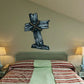 Ornate cross wall sticker with dark metallic raised design