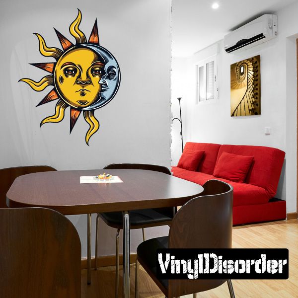 Ornate sun and moon wall decal with gold-and-blue faces and black rays