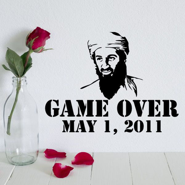 Wall decal: black portrait with 'GAME OVER' and 'MAY 1, 2011'
