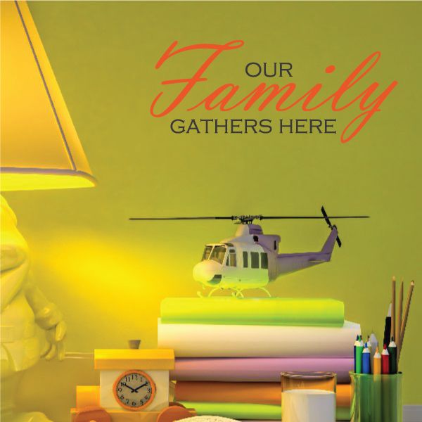 Printed die-cut wall decal reading 'Our Family Gathers Here'