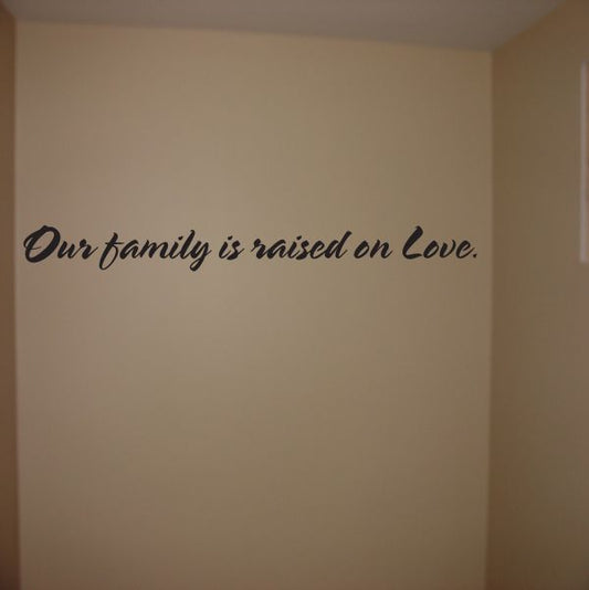 Image of Our family is raised Wall Decal