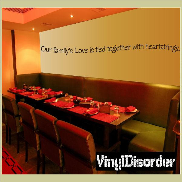 Wall decal text: 'Our family's Love is tied together with heartstrings'