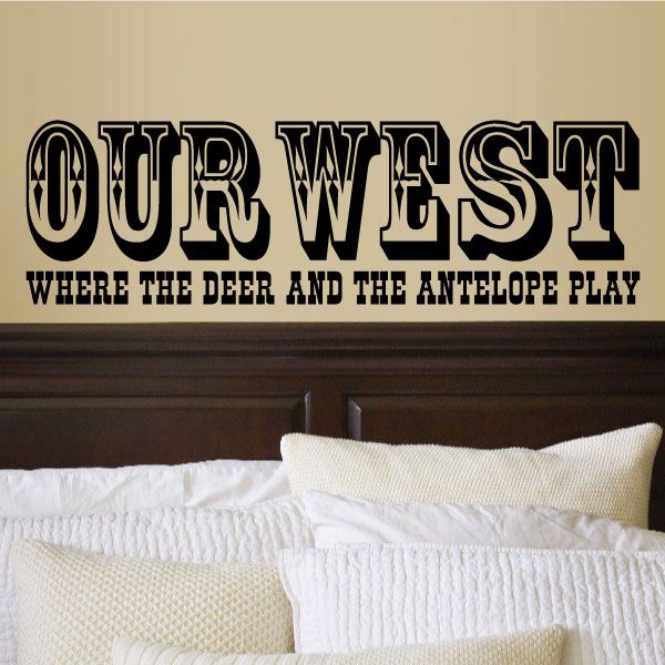 Wall decal quote in bold black text: 'Our West' and 'deer and antelope play'