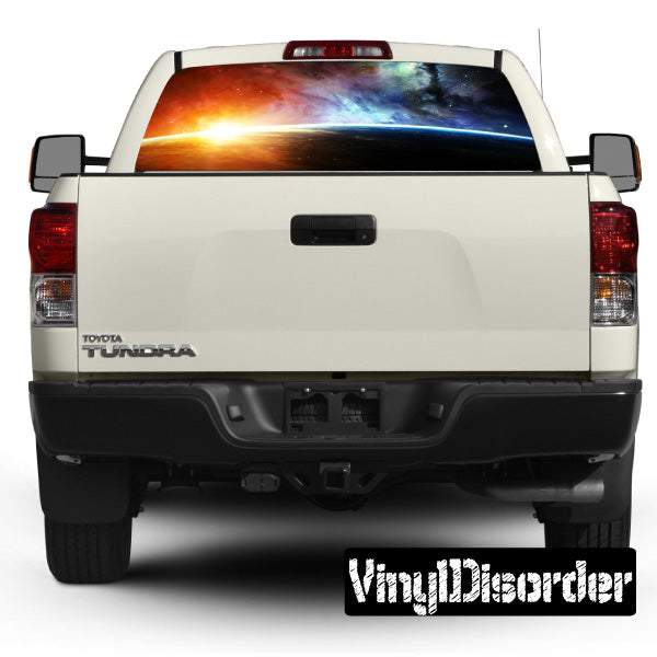 Rear window graphic decal with space scene on pickup truck