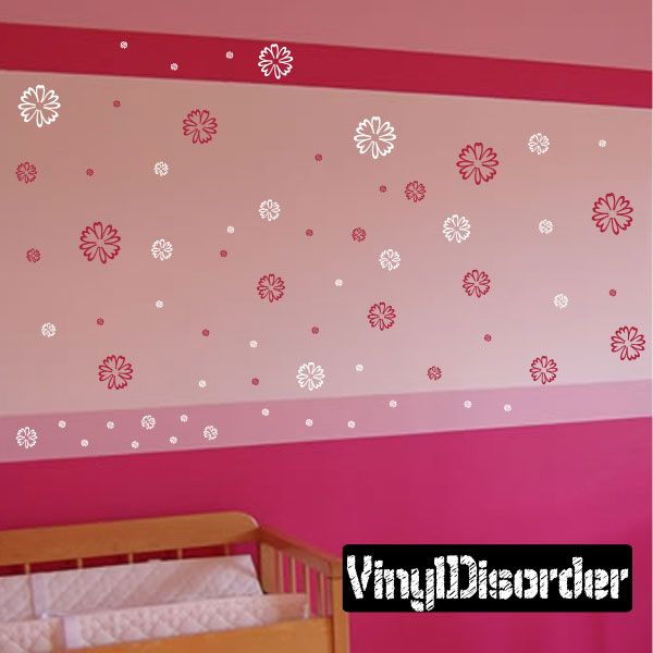 Outlined flower wall decals in pink and white with small dot accents
